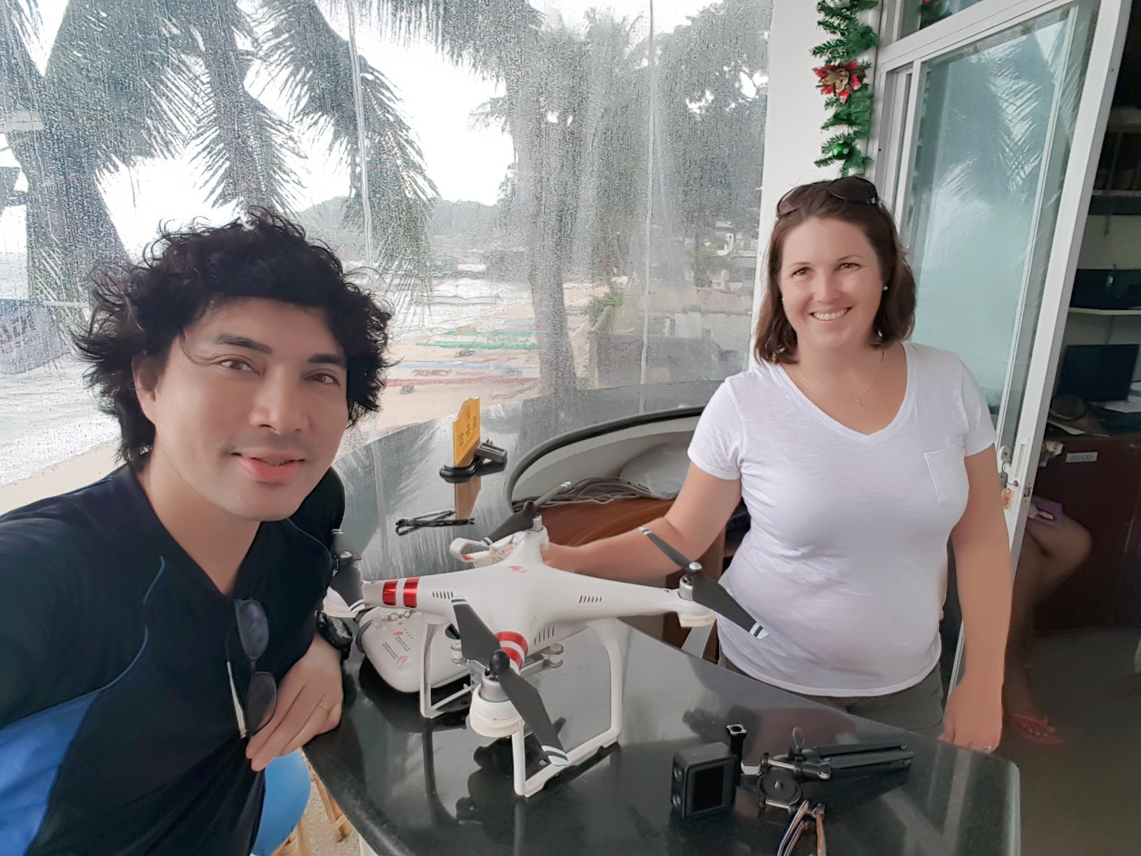 Me with Amy Magsino while waiting for the rain to stop so I can fly my drone and take amazing aerial footage of the Puerto Galera.
