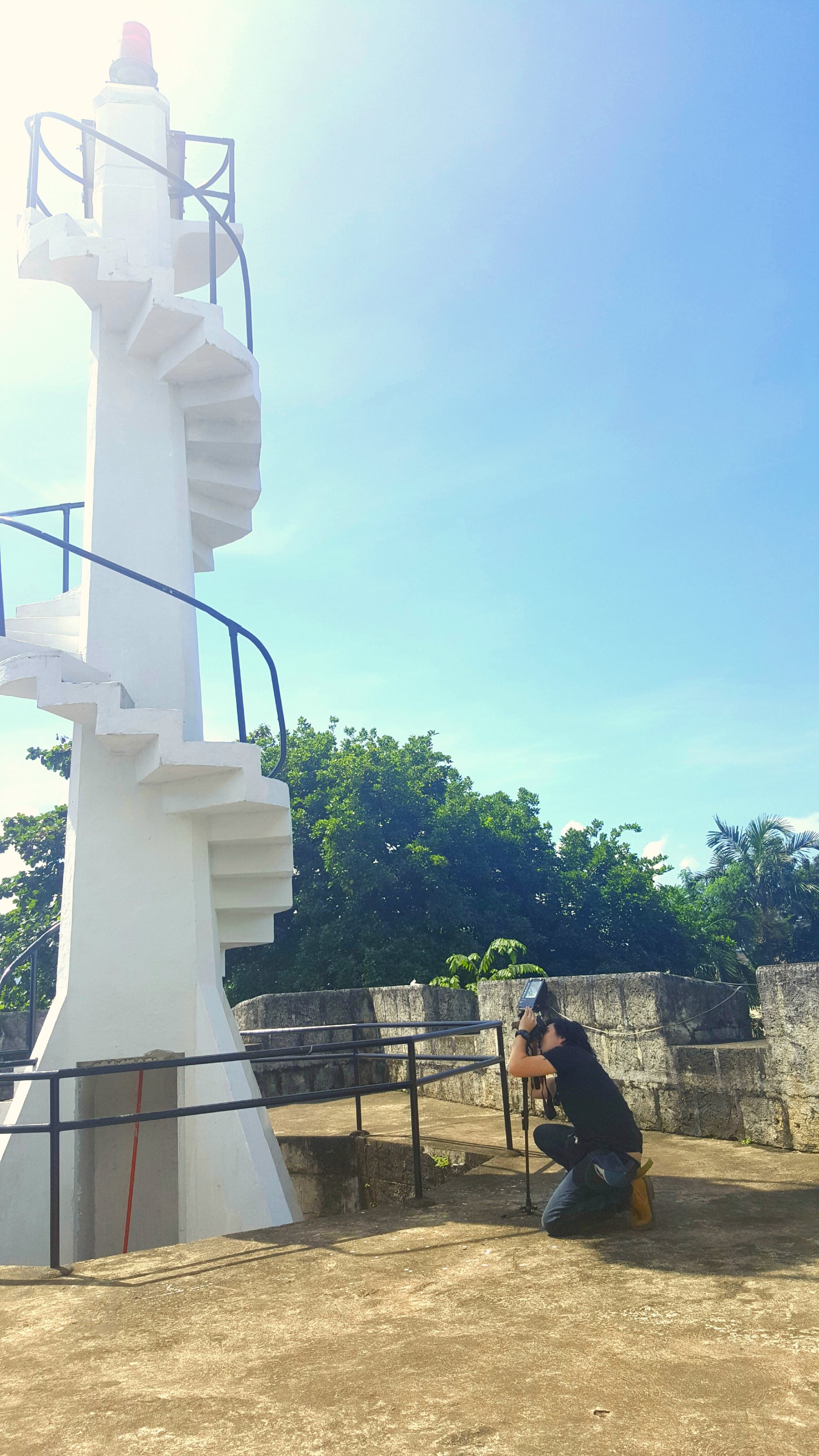 Me in my all-out effort to take a photo of the The Lighthouse of the Fuerte De La Concepcion Y Del Triunfo of Cotta Fort in Ozamiz City